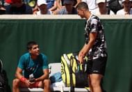 Carlos Alcaraz and Hubert Hurkacz interact with each other.